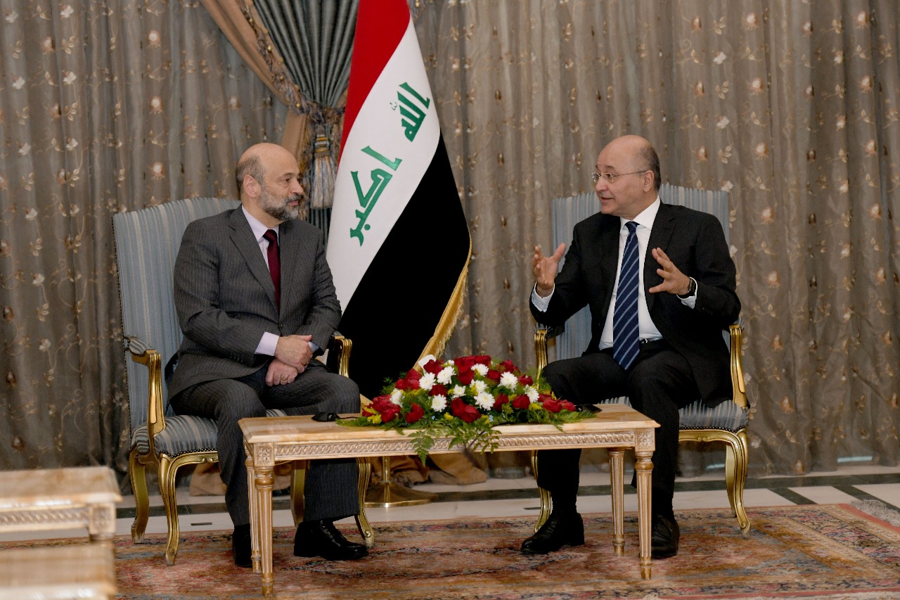 رئيس الجمهورية يؤكد أهمية تطوير التعاون بين العراق والاردن