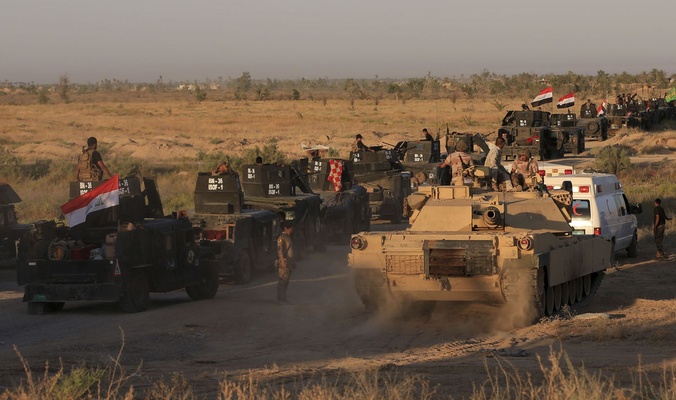 العمليات المشتركة: الشرقاط محاصرة بالكامل ولامنافذ لداعش