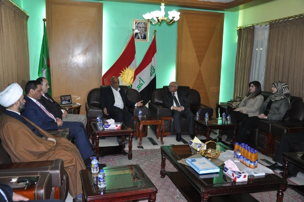 وفد من التحالف الوطني يزور مكتب العلاقات الوطنية للـ أ.و.ك في بغداد