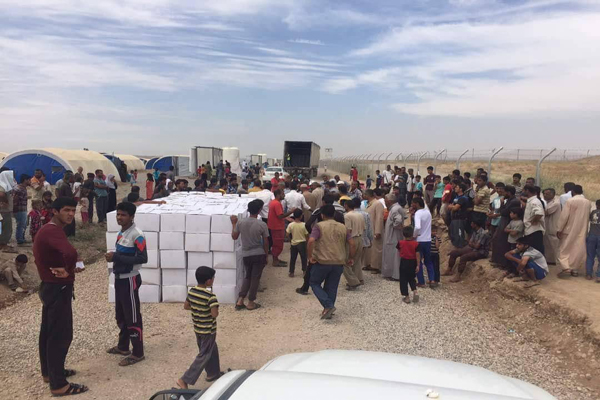 توزيع آلاف المساعدات الإغاثية للنازحين في دهوك