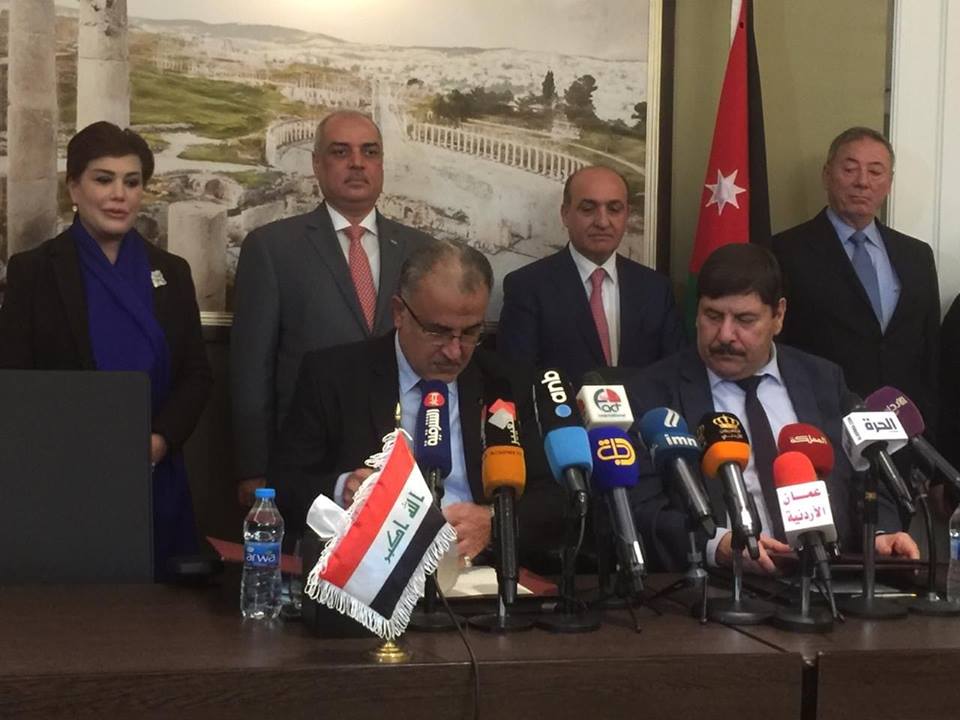 العراق والاردن يوقعان اتفاقية النقل البري