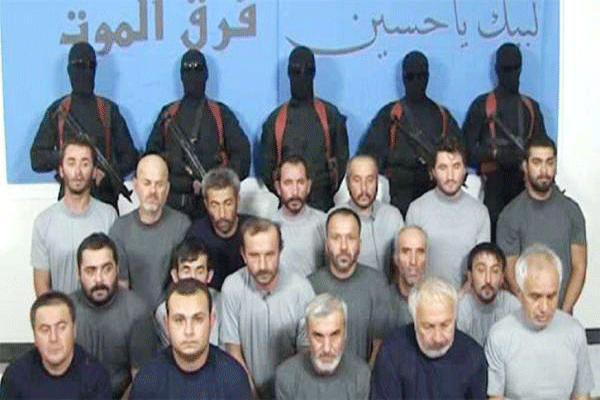 أوغلو: سفيرنا استلم العمال الـ 16 المختطفين في بغداد