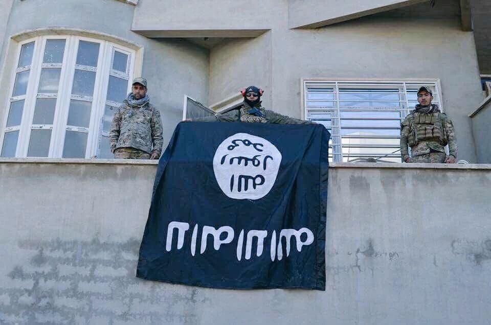 مقاتلون عراقيون يسيطرون على مبنى في ايمن الموصل