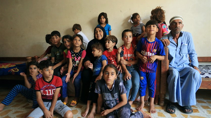 جدة عراقية ترعى 22 حفيدا بعد مأساة داعش
