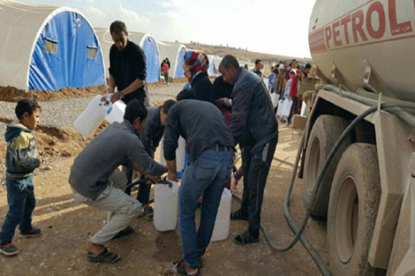 توزيع النفط الأبيض على النازحين في إقليم كوردستان 