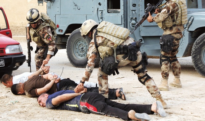 اعتقال 12 ارهابيا بينهم قياديون في الموصل