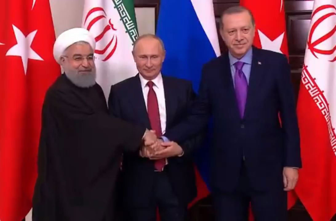 فلاديمير بوتين وحسن روحاني ورجب اردوغان