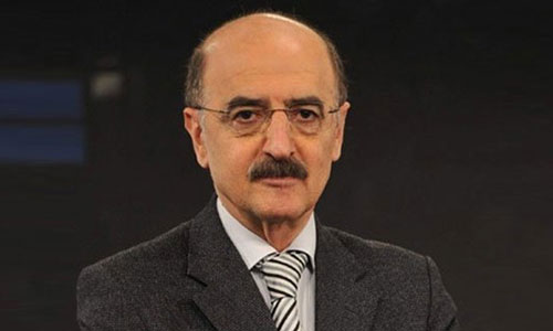 الكاتب والصحفي حسني محلي