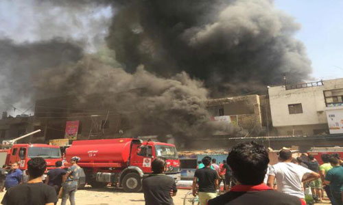 اخماد حريق نشب وسط بغداد