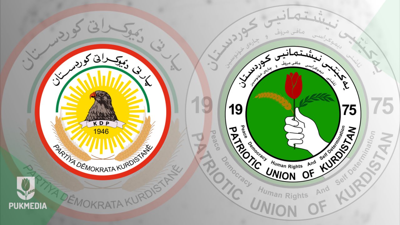 PUK's logo is to the right, and KDP's logo is on the left