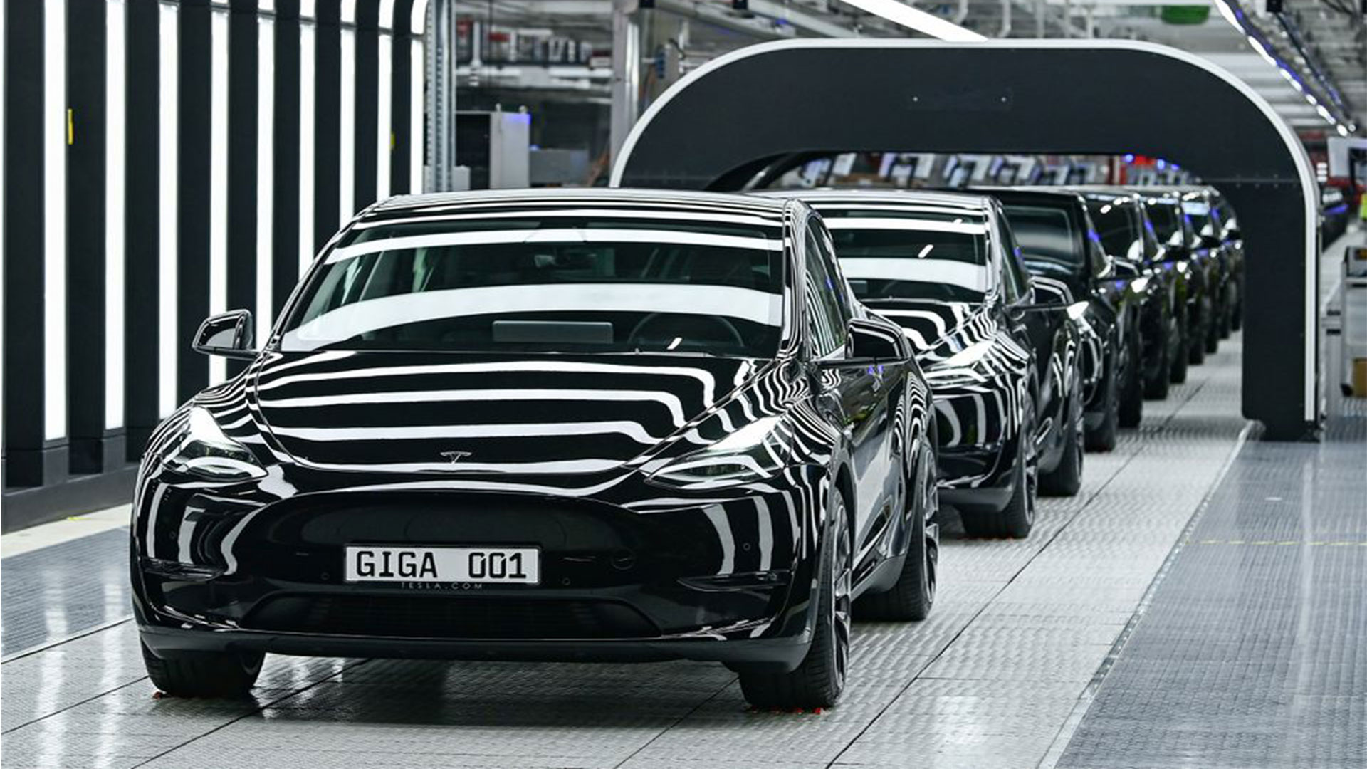  Model Y cars are pictured during the opening ceremony of the new Tesla Gigafactory for electric cars in Gruenheide, Germany, March 22, 2022. Patrick Pleul/Pool via REUTERS