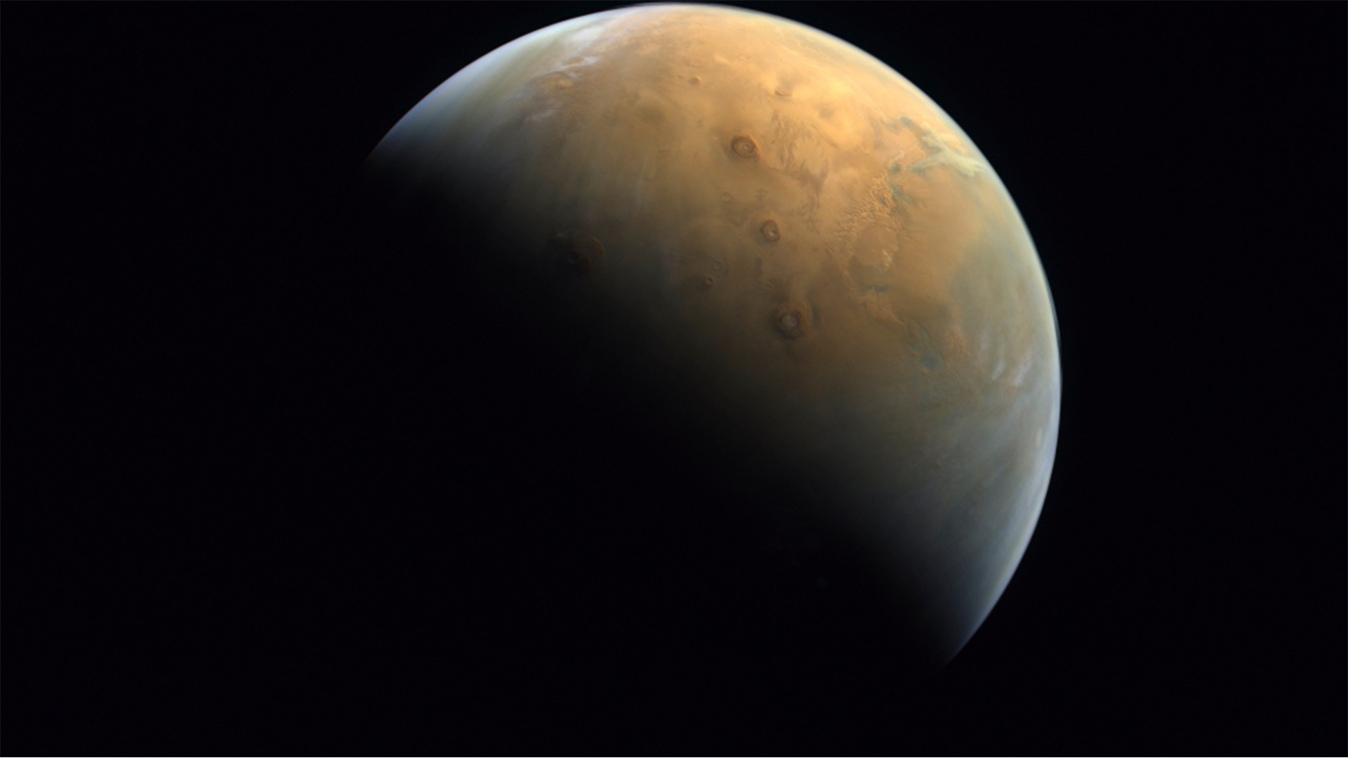 This Feb. 10, 2021 image taken by the United Arab Emirates' "Amal," or "Hope," probe was released Sunday, Feb. 14, 2021, shows Mars . The Hope space probe now circles the red planet. (Mohammed bin Rashid Space Center/UAE Space Agency, via AP)