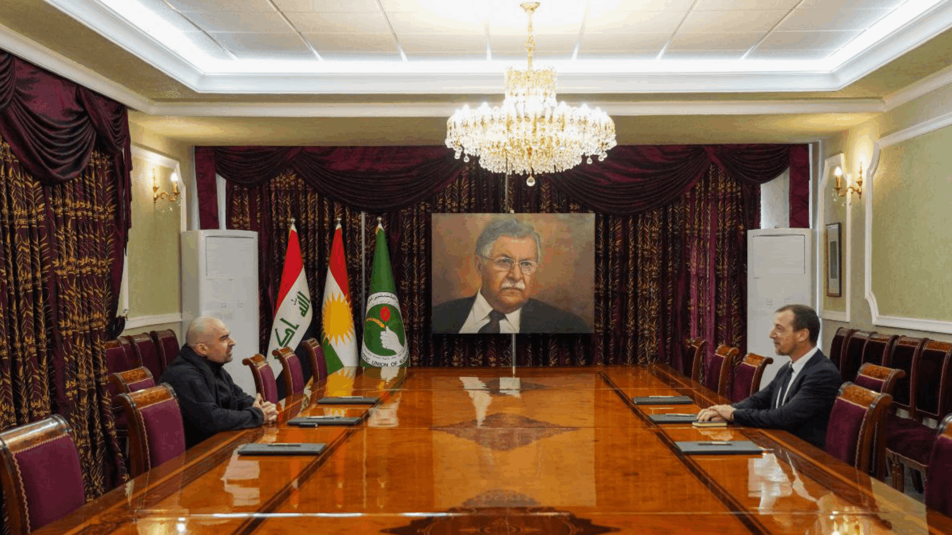  PUK President on the left and French Consul General on the right of the meeting's table.