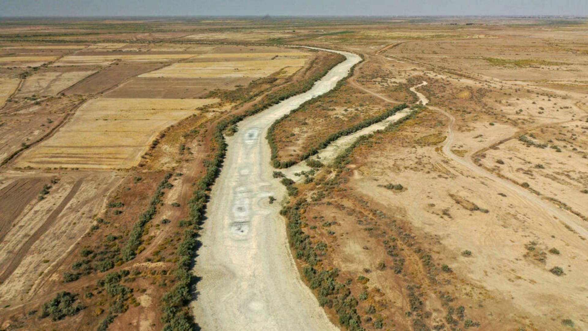  An aerial view taken on September 24, 2021 shows a dried up river bed in the Al-Huwaiza marshes on Iraq's border with Iran Asaad NIAZI AFP/File