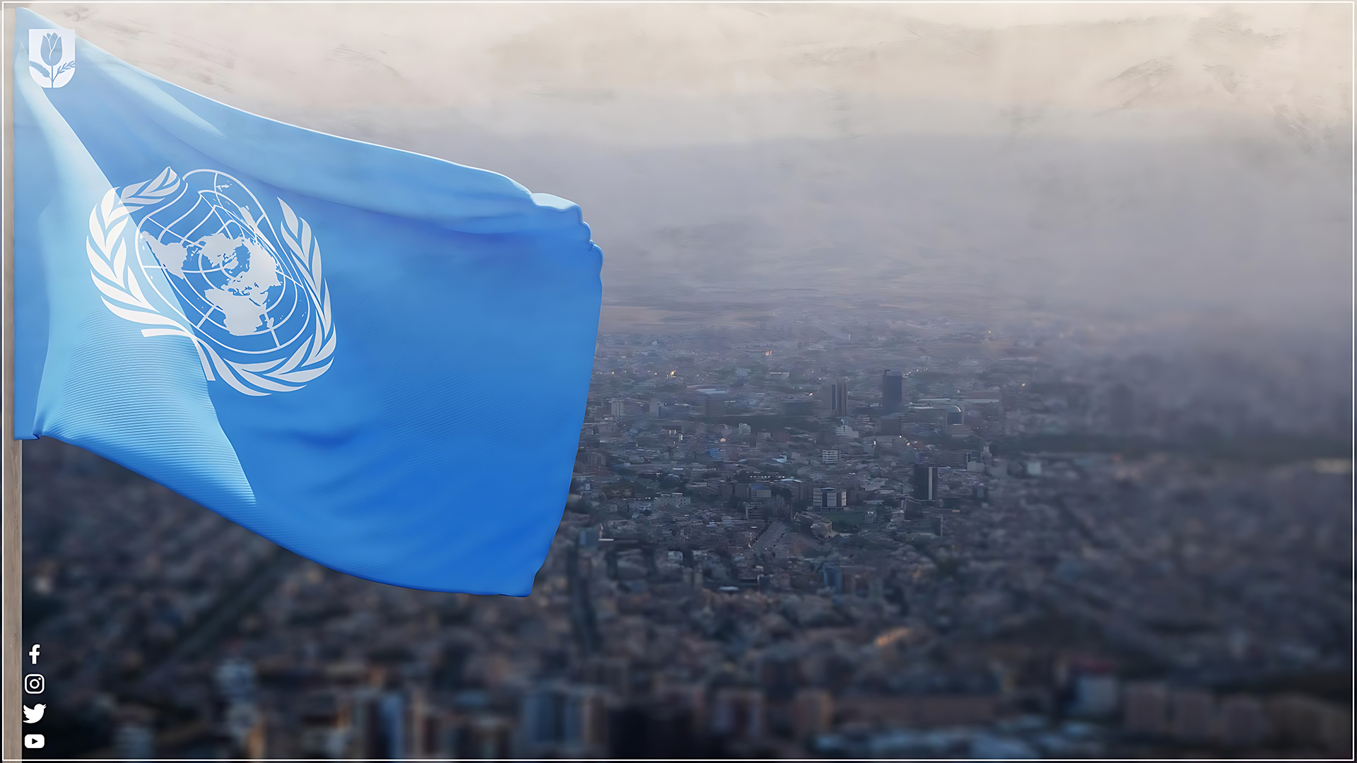  UN flag and the background is Sulaymaniyah city