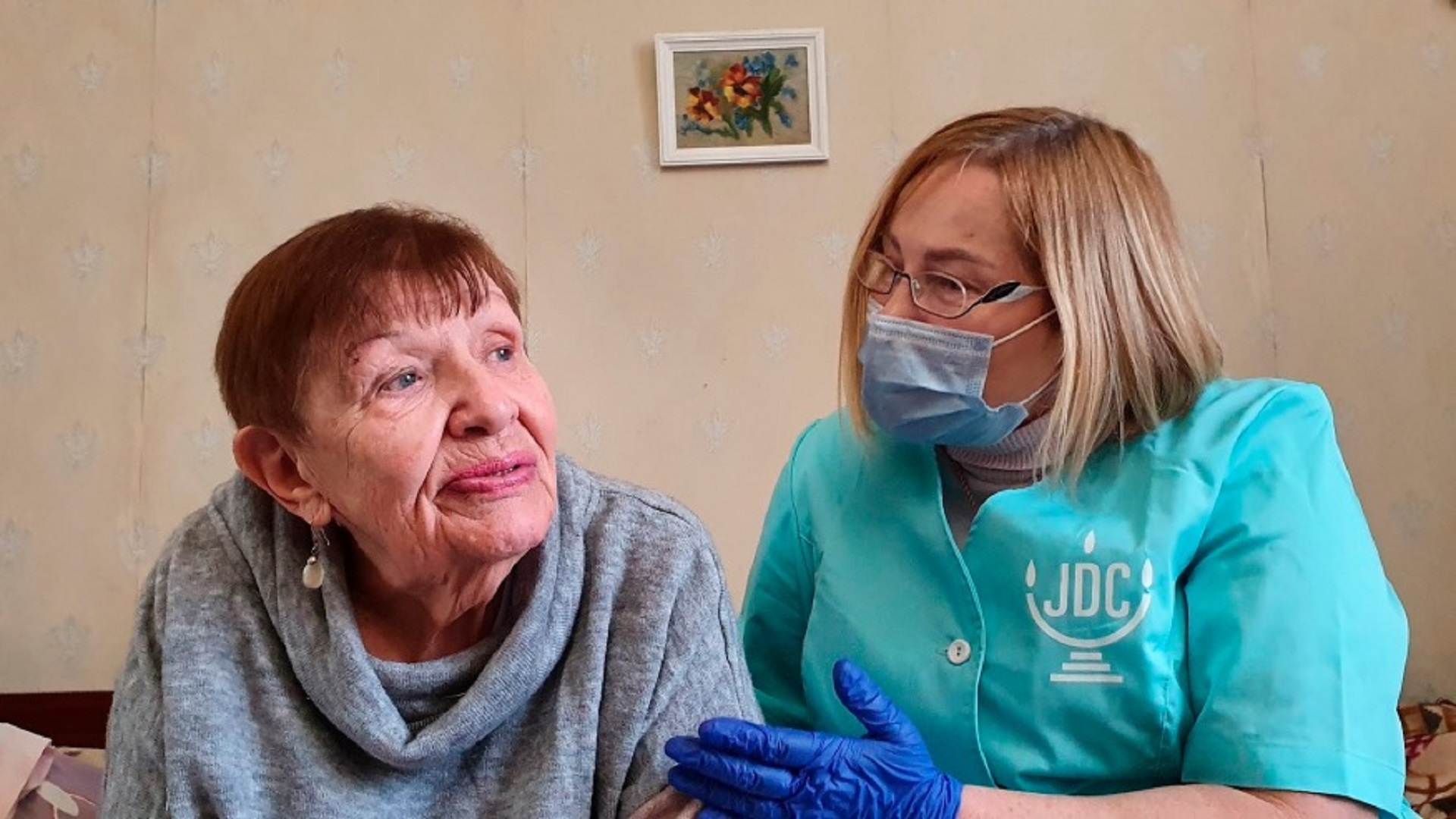  Natalia Berezhnaya, left, is seen in Odessa, Ukraine, in this undated photo with her home care worker as one of approximately 5,200 Holocaust survivors in Ukraine who receives ongoing home care funded by the Claims Conference and implemented by the 