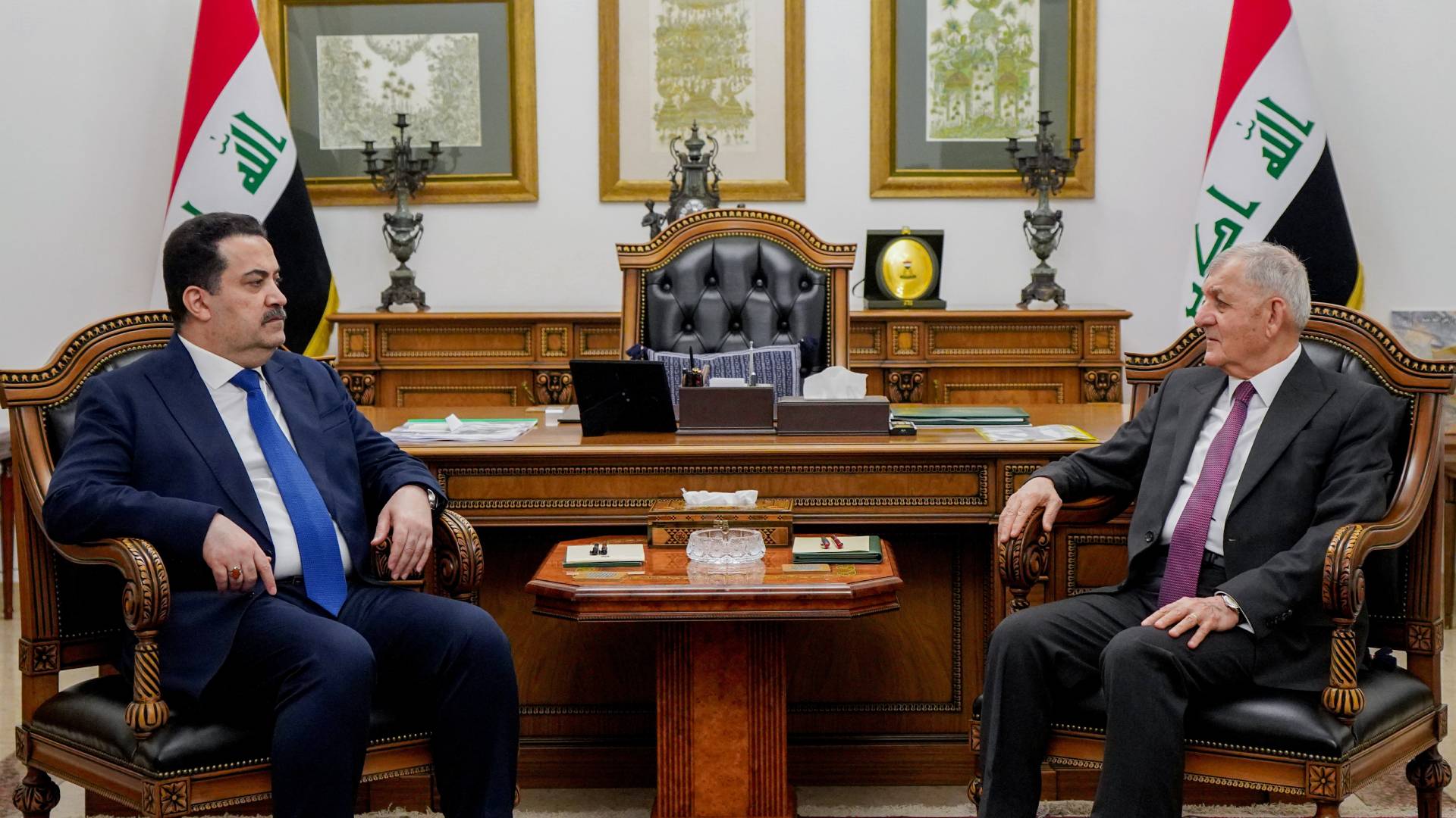  Iraqi President on the right and Iraqi Prime Minister on the left.