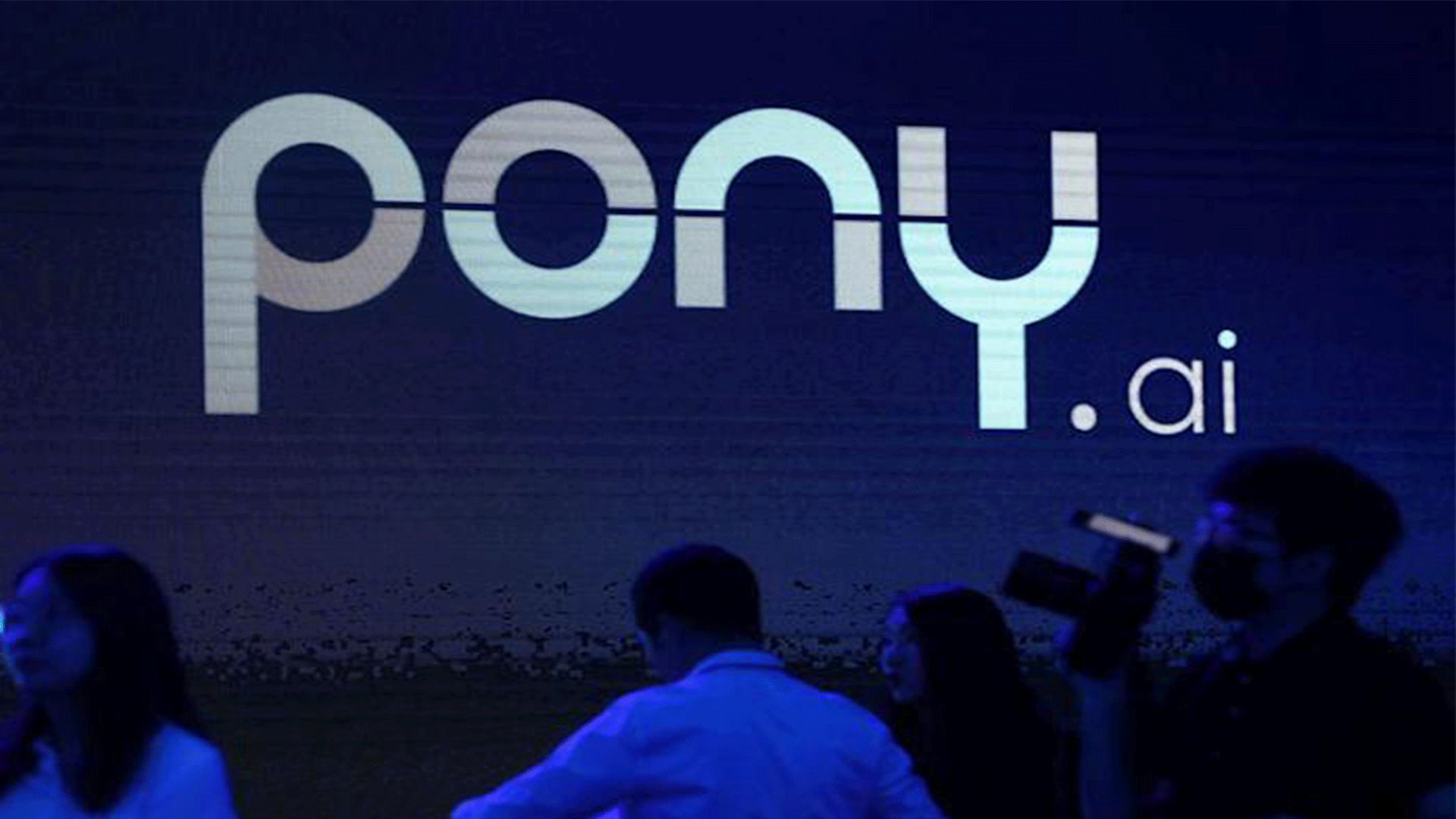  A logo of the autonomous driving technology startup Pony.ai is seen on a screen during an event in Beijing, China May 13, 2021. REUTERS/Tingshu Wang