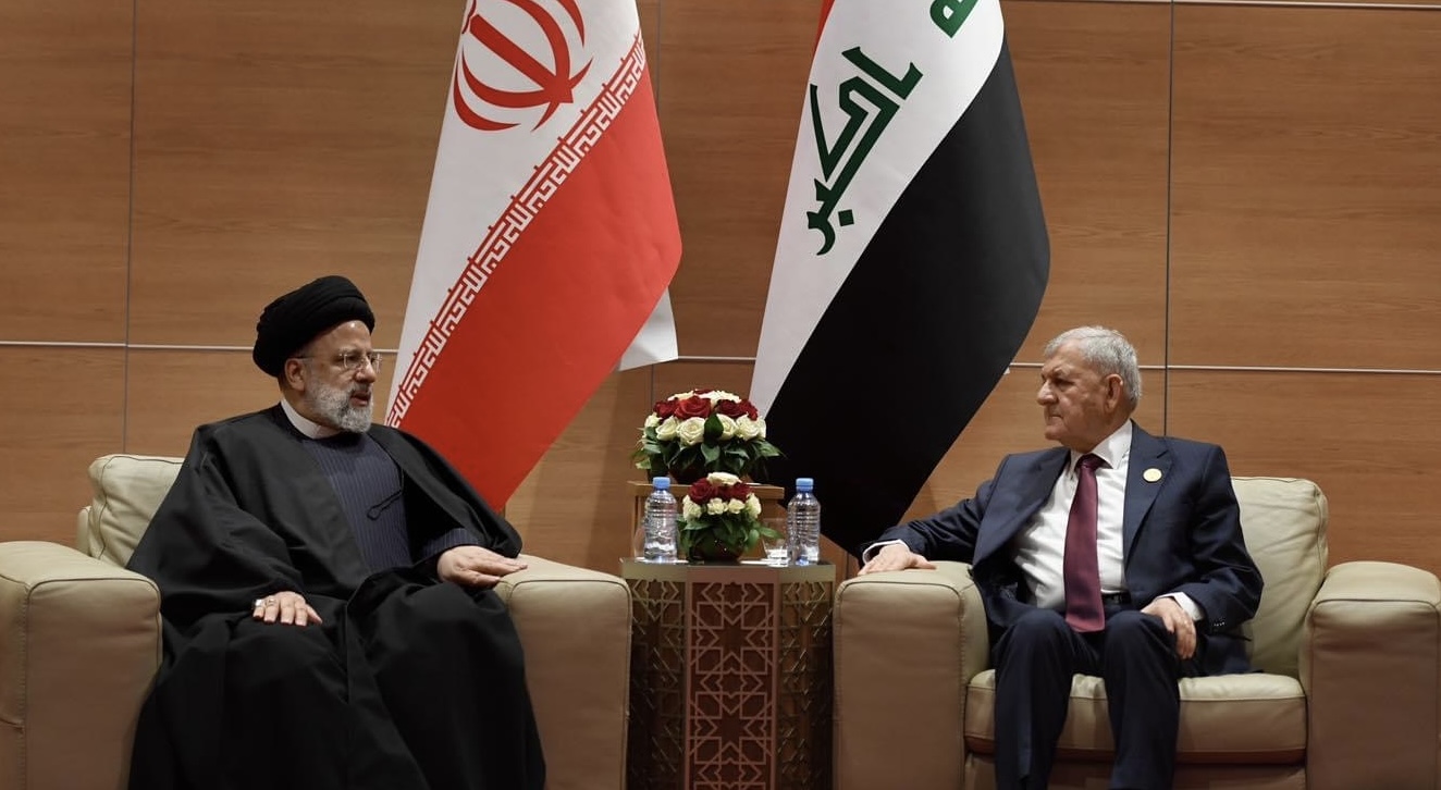  Iraqi President on the right and Iranian President on the left.