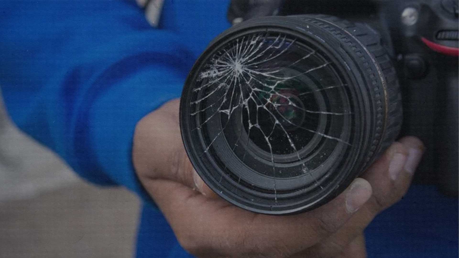  A journalist's broken camera lens.
