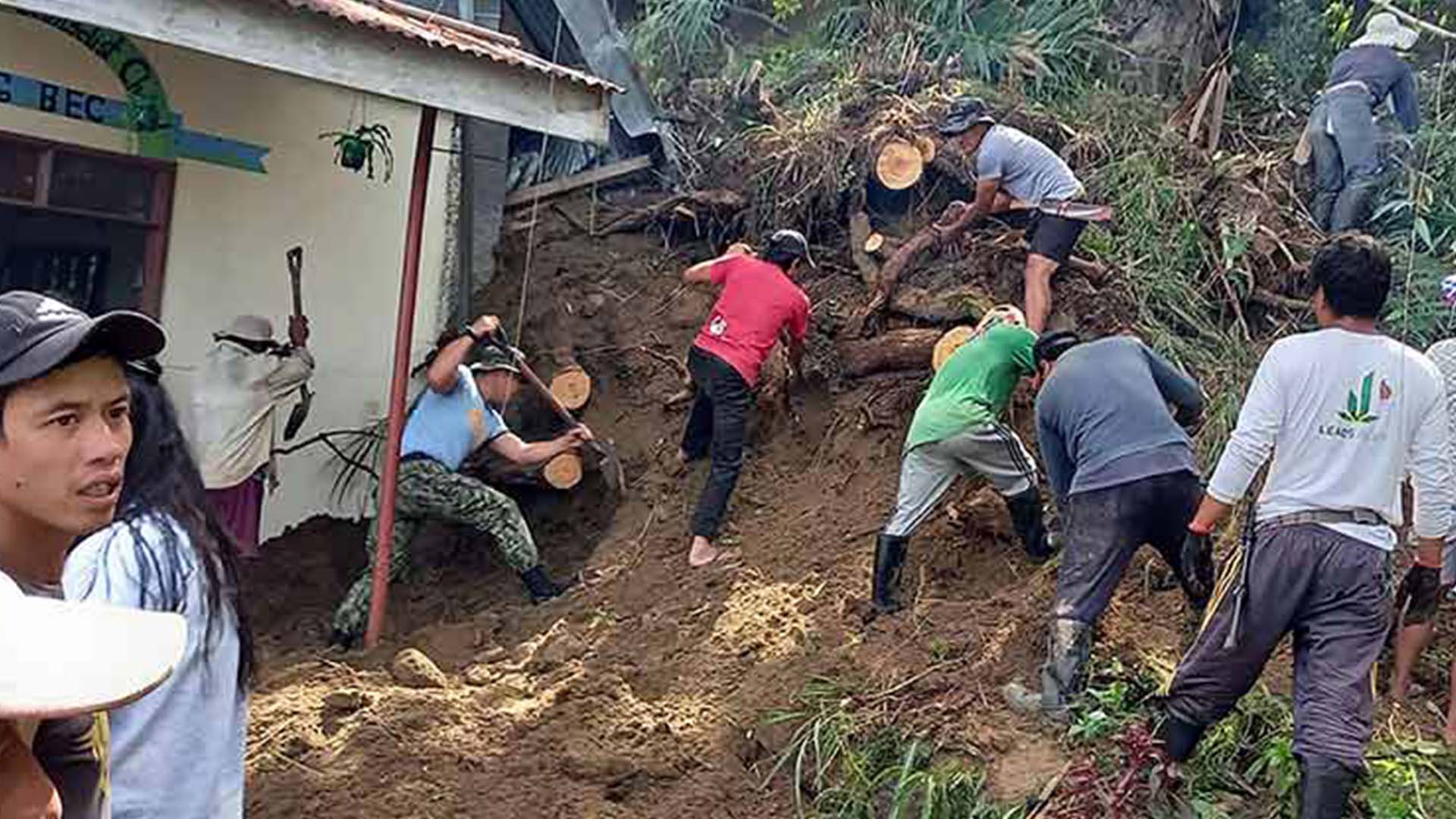  Villagers and rescue workers digging following a landslide caused by a 7.0-magnitude quake in Philippines. AFP
