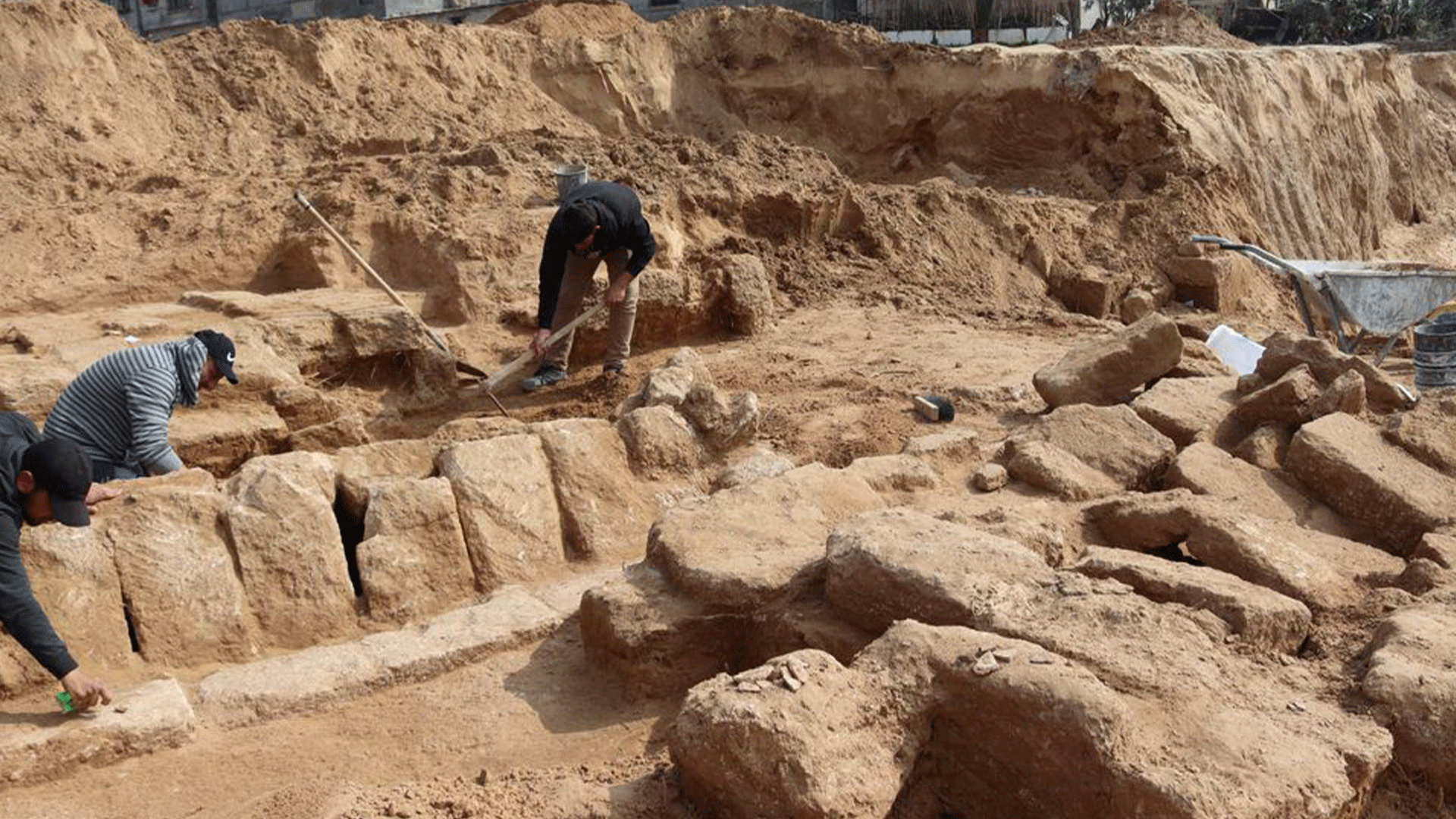  Men work in a newly discovered Roman cemetery in Gaza, in this handout photo obtained by Reuters, February 17, 2022. Ministry of Tourism and Antiquities/Handout via REUTERS