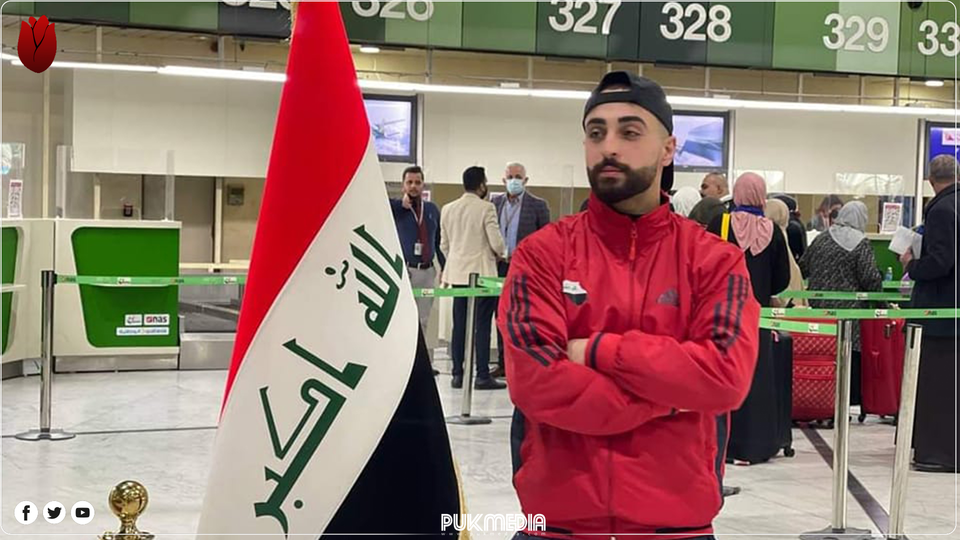  Kurdish Karate player Rawand Ayub with Iraqi flag. 