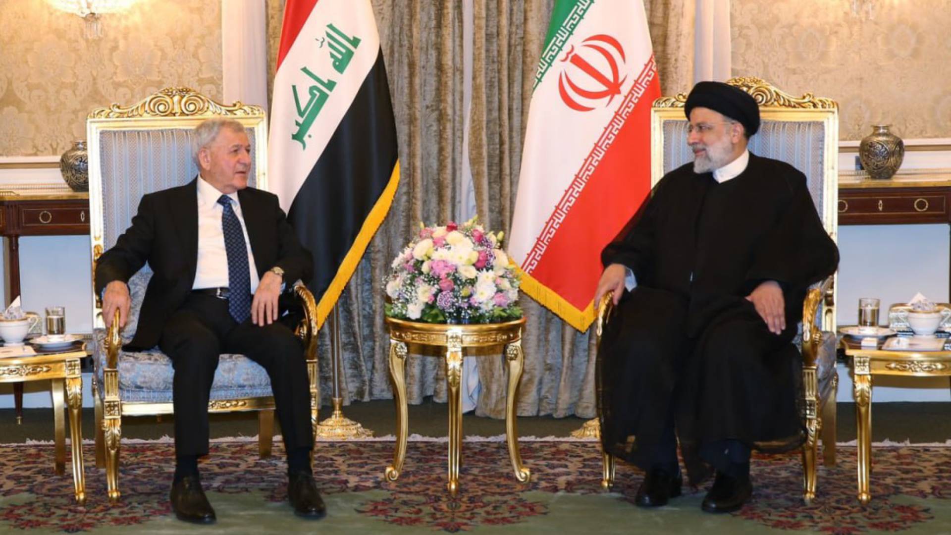  Iraqi President and Iranian President.