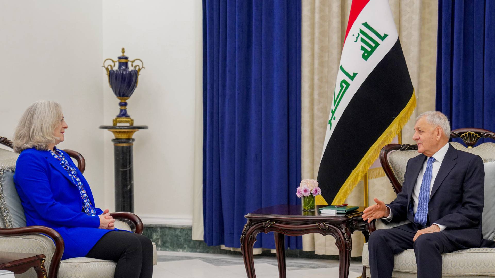  Iraqi President on the right and U.S. Ambassador on the left.